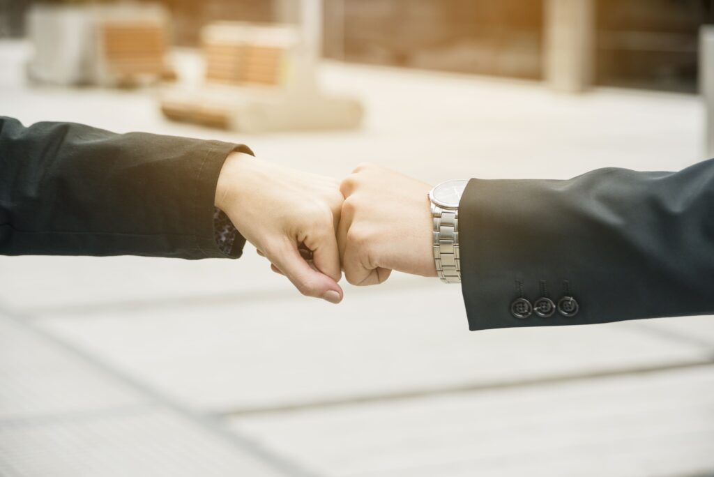 business partnership handshake teamwork concept for google ads agency