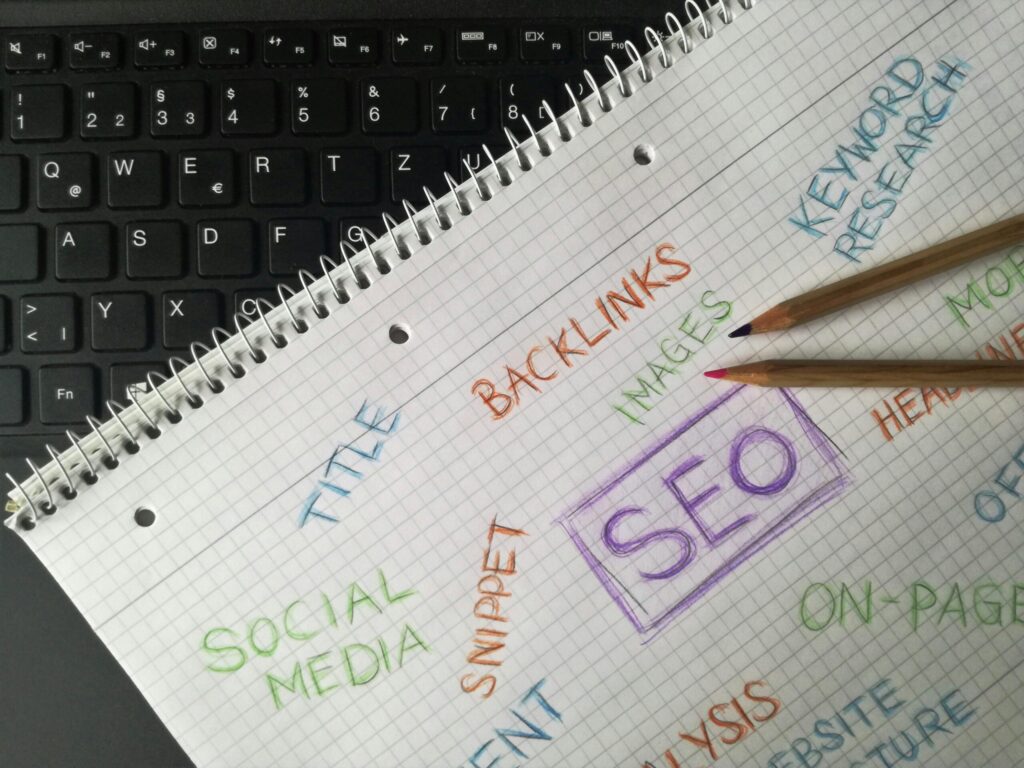 SEO strategy notebook with keywords, backlinks, and content planning sketches