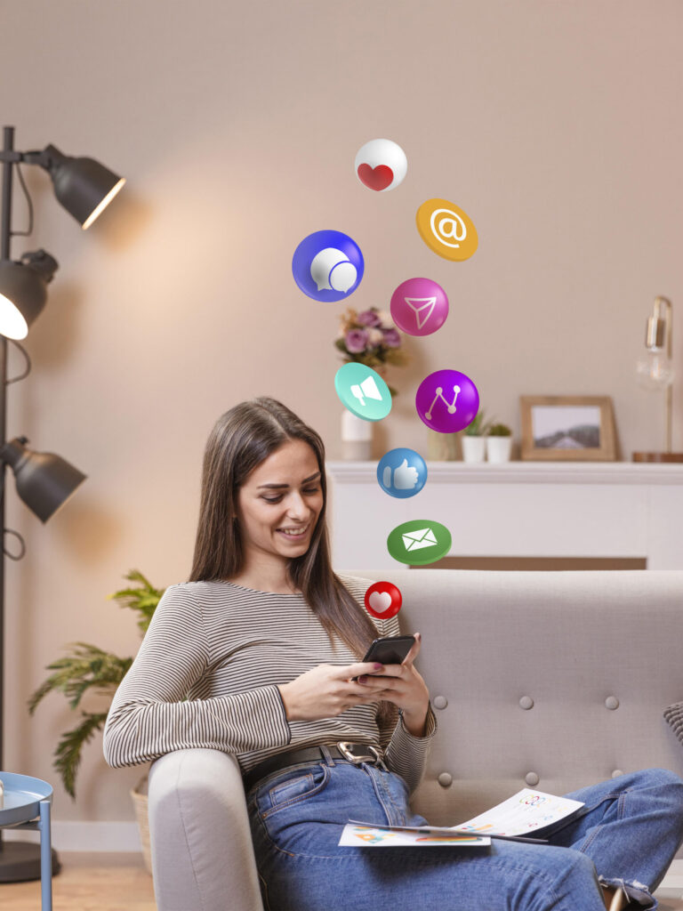 Woman using phone with social media icons – social media marketing strategy in Sharjah
